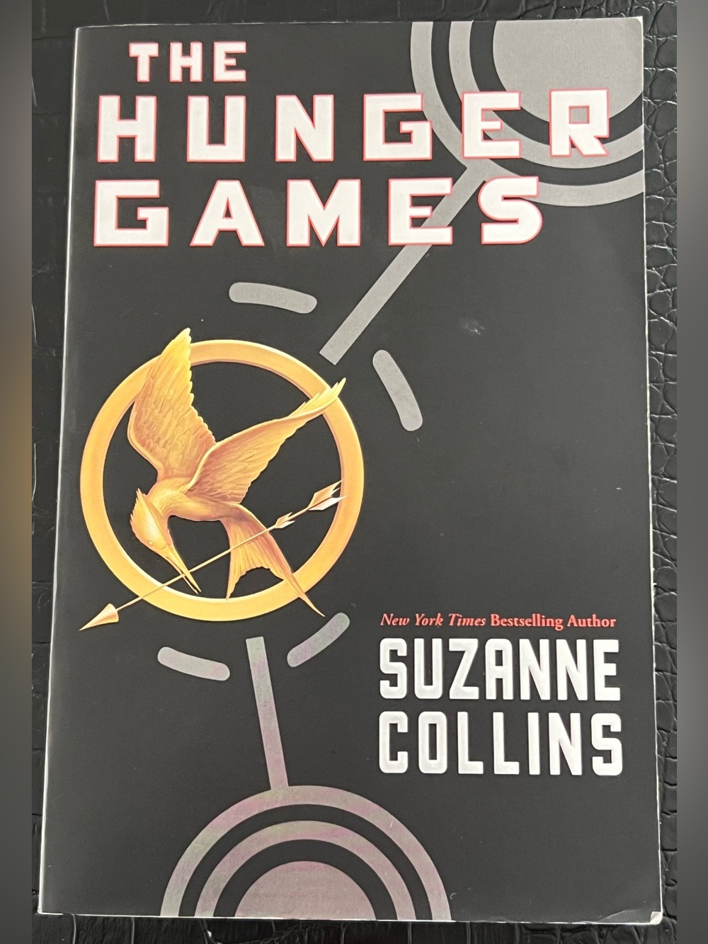 Scholastic The Hunger Games by Suzanne Collins Paperback Edition